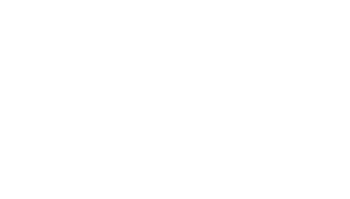 A black and white logo with the words "Lofts on Main" below it.